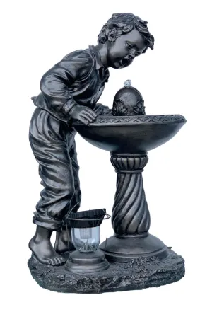 Boy Drinking at Water Fountain